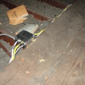 44 The new attic wiring was stapled tight to the edge of the floor boards to prevent a trip hazard. All the wires are marked to where they go to