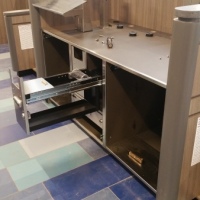 Installation Of A Stainless Steel Desk At An Airport