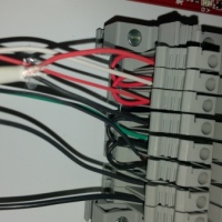 Showing Jumper Wires Terminated On A Din Rail System