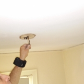 08-Getting the wires ready to cut in a junction box to mount a ceiling light fixture to